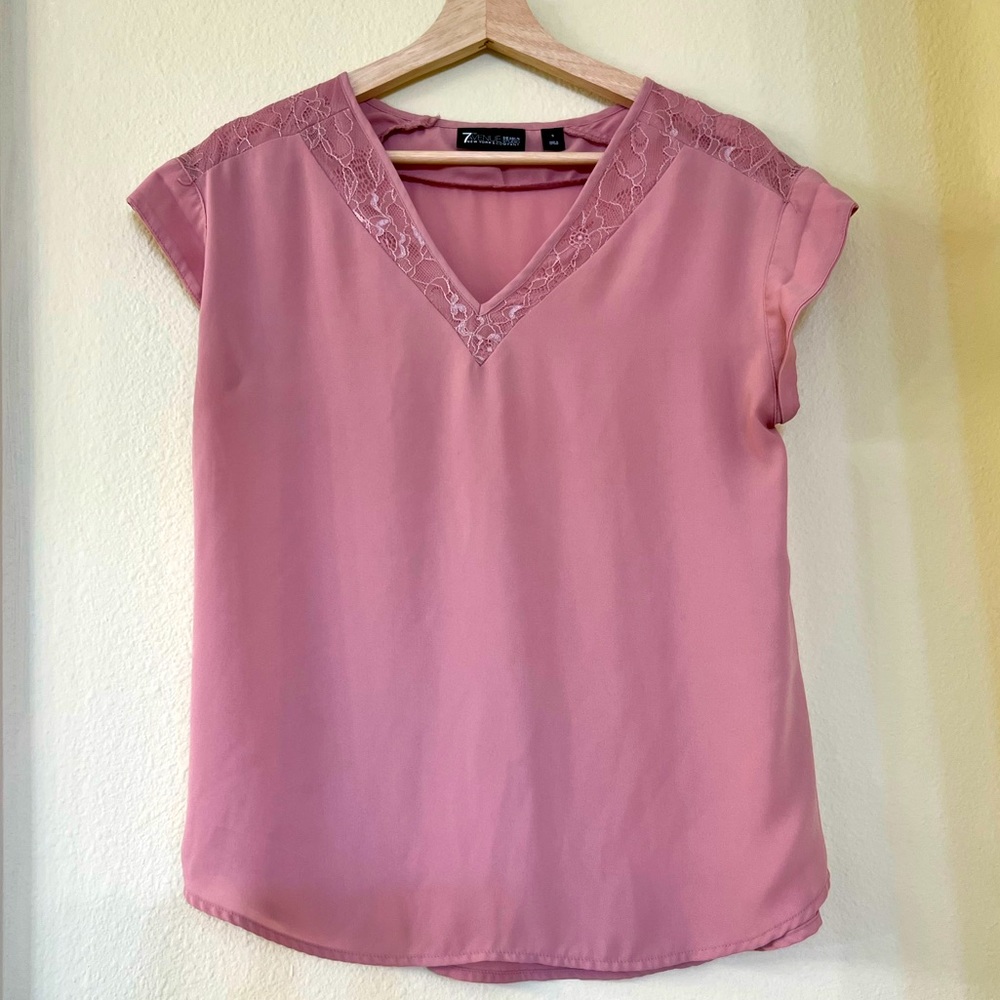 Blush color top with lace detail. Size S.